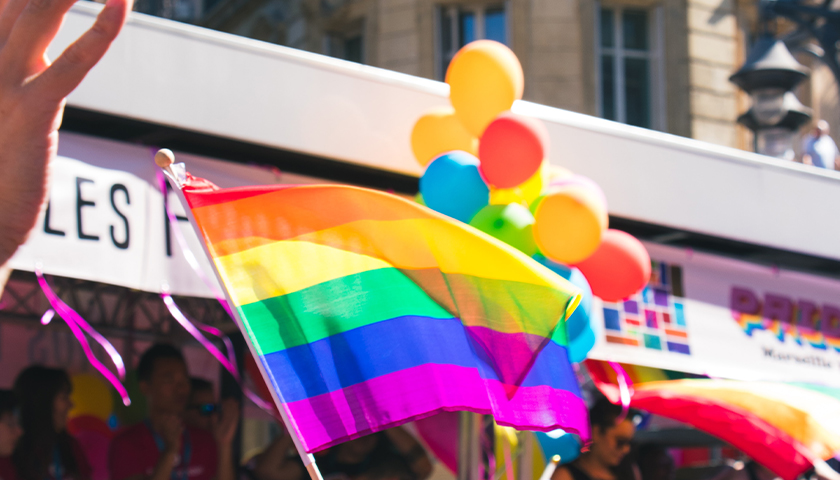 Pride flag (rainbow) waving in the air